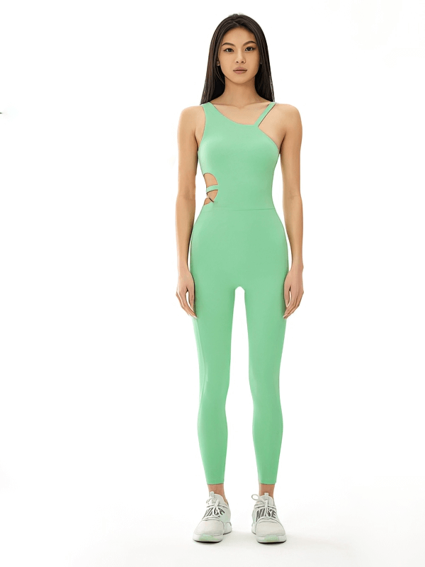 Woman wearing green sports elastic sleeveless yoga jumpsuit SF1046, showcasing comfortable and flexible design for active movement.